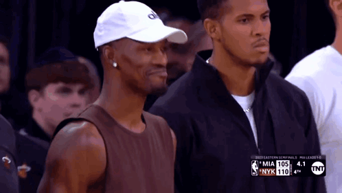 A Basketball Game Is Being Played Between The Miami Heat And Nyk GIF