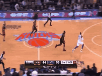 A Basketball Game Is Being Played Between The New York Knicks And Miami Heat GIF