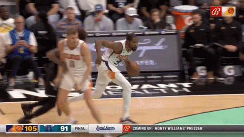 A Basketball Game Is Being Played Between The Suns And The Wizards GIF