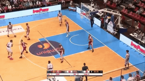 A Basketball Game Is Being Played In A Stadium With A Unisys Logo On The Floor GIF