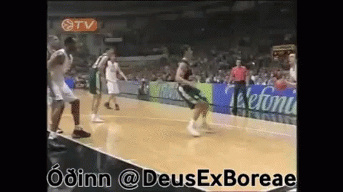 A Basketball Game Is Being Played In A Stadium With Advertisements For Telefoni GIF