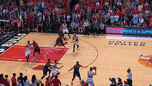 A Basketball Game Is Being Played In A United Center GIF