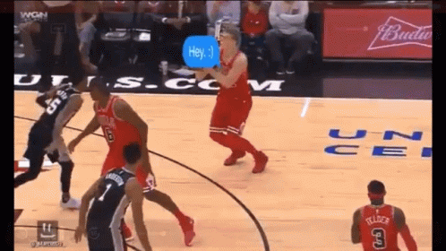 A Basketball Game Is Being Played In Front Of A Budweiser Banner GIF