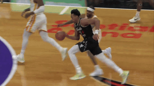 a basketball game is being played in front of a capitol building