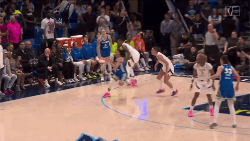A Basketball Game Is Being Played In Front Of A Crowd And The Number 32 Is On The Back Of A Player GIF