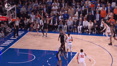 A Basketball Game Is Being Played In Front Of A Crowd At The New York Knicks GIF