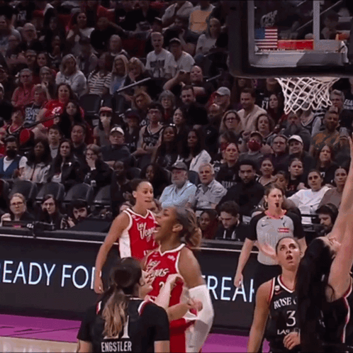 A Basketball Game Is Being Played In Front Of A Crowd That Is Ready For Real GIF