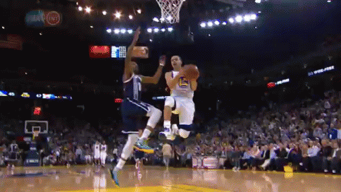 A Basketball Game Is Being Played In Front Of A Crowd With A Dell Logo In The Background GIF