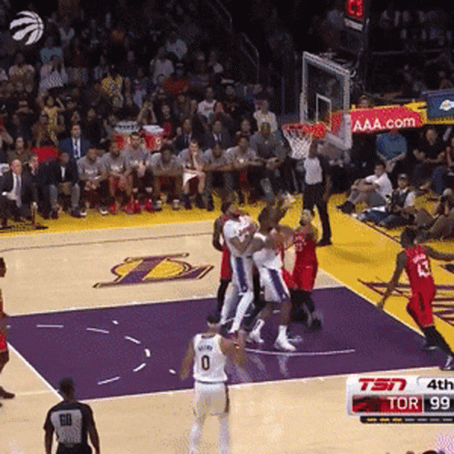 A Basketball Game Is Being Played In Front Of A Crowd With A Tsn Sign In The Background GIF
