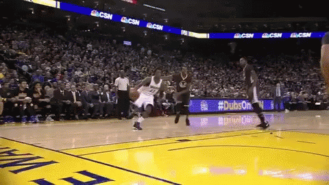 A Basketball Game Is Being Played In Front Of A Crowd With Ads For Dubs On The Sidelines GIF