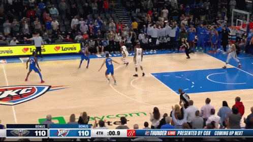 A Basketball Game Is Being Played In Front Of A Crowd With The Score 110 To 110 GIF