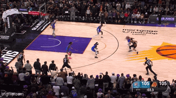 A Basketball Game Is Being Played In Front Of A Mortgage Matchup Center GIF