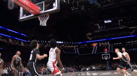 Basketball Game In Front Of Redbull Banner GIF