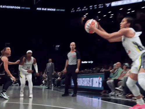 A Basketball Game Is Being Played In Front Of A Scoreboard That Says " Weatherspoon " GIF