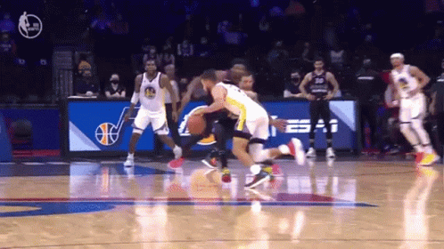 A Basketball Game Is Being Played In Front Of A Sign That Says Espn On It GIF