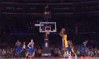 A Basketball Game Is Being Played In Front Of A Toyota Ad GIF