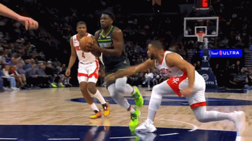 A Basketball Game Is Being Played On A Court Sponsored By Bud Light GIF
