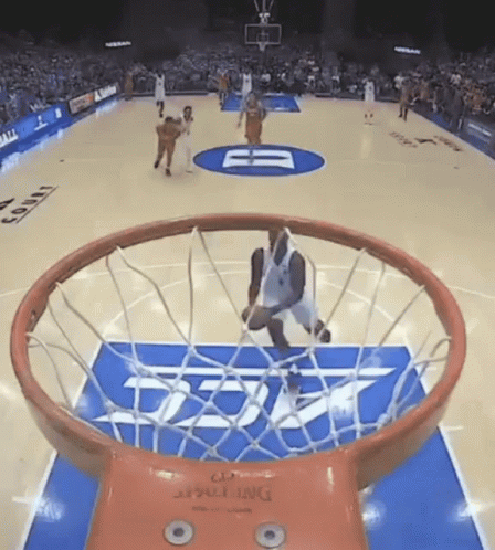 A Basketball Game Is Being Played On A Court That Has A Spalding Logo On It GIF