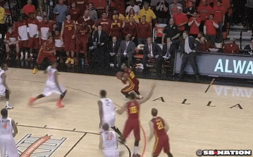 a basketball game is being played on a court that has the word alla on it