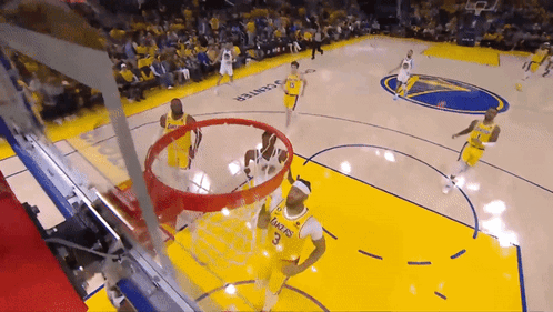 A Basketball Game Is Being Played On A Court That Has The Word Lakers On It GIF