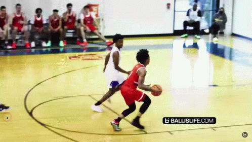 A Basketball Game Is Being Played On A Court With A Ballislife.com Logo GIF