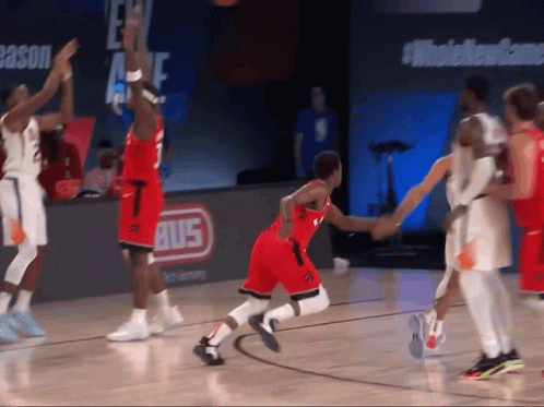A Basketball Game Is Being Played On A Court With A Bus Sign In The Background GIF