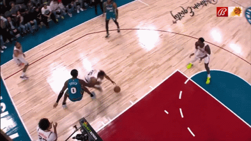 A Basketball Game Is Being Played On A Court With A Southwest Capital Advertisement GIF