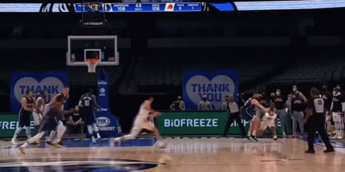 A Basketball Game Is Being Played On A Court With A Thank You Sign In The Background GIF