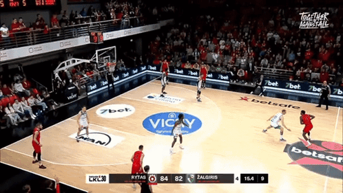A Basketball Game Is Being Played On A Court With A Vicky Logo GIF