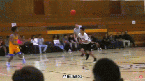 A Basketball Game Is Being Played On A Court With The Letters Gv On The Bottom Right GIF