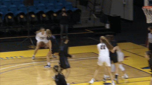 A Basketball Game Is Being Played On A Court With The Word Entl On It GIF