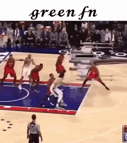 a basketball game is being played on a court with the words green fn above it