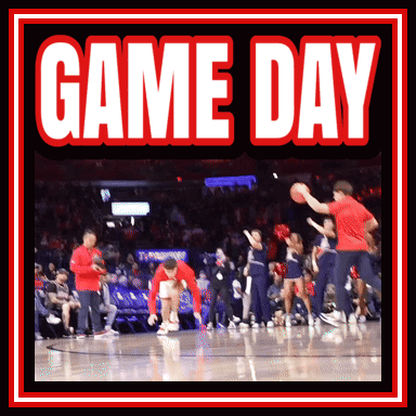 A Basketball Game Is Being Played On Game Day With Cheerleaders On The Court GIF