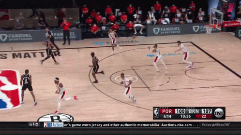 A Basketball Game Is Being Played On Tnt GIF