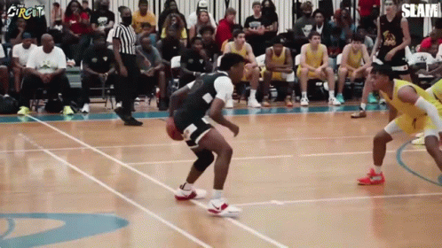 a basketball game is being played with the word slam on the bottom