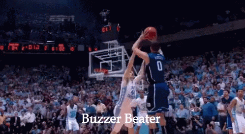 A Basketball Game Is Being Played With The Words Buzzer Beater At The Top GIF