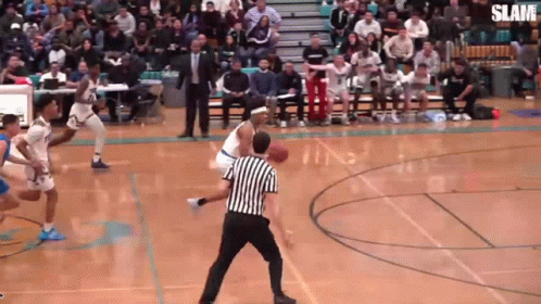 A Basketball Game Is Being Played With The Words Slam On The Bottom GIF