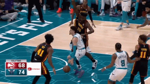 a basketball game is going on and the score is 68 to 74