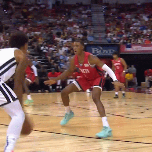 A Basketball Game Is Underway With A Boyd Advertisement In The Background GIF