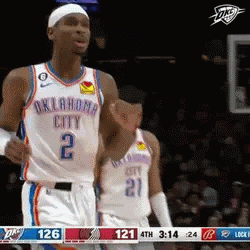 A Basketball Player For Oklahoma City Is Giving A Fist Bump GIF