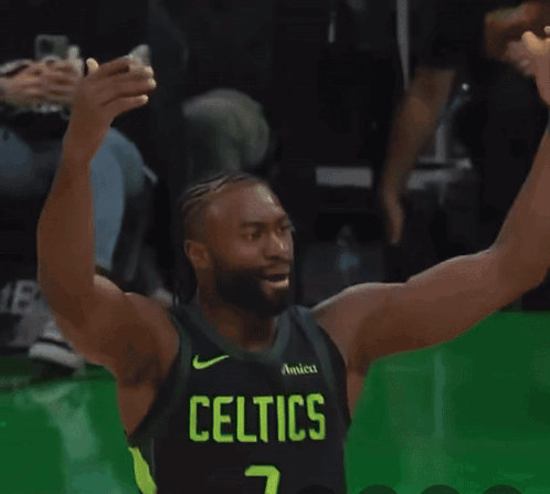A Basketball Player For The Celtics Is On The Court GIF