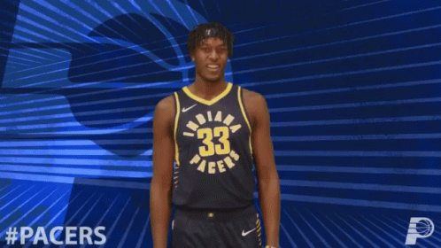 A Basketball Player For The Indiana Pacers Celebrates With His Arms Outstretched GIF