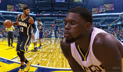a basketball player for the indiana pacers is holding a basketball
