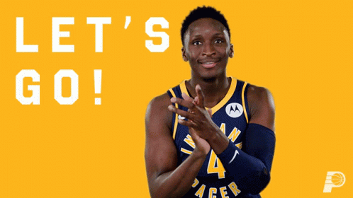 A Basketball Player For The Indiana Pacers Is Standing In Front Of A Yellow Background That Says Let 'S Go GIF