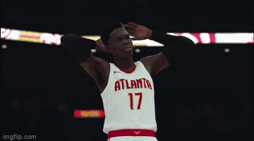 A Basketball Player For The Wolves Stands On The Court GIF