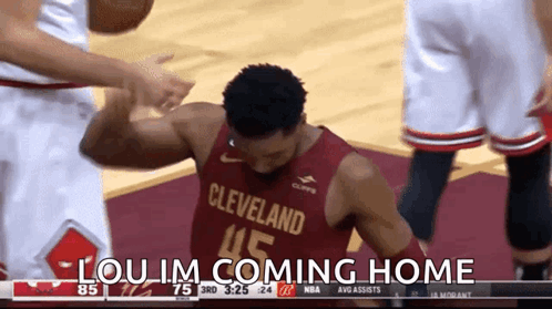 A Basketball Player From The Cleveland Team Is Being Congratulated GIF