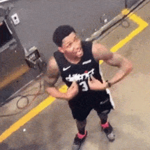 A Basketball Player In A Black Jersey With The Number 3 On It GIF