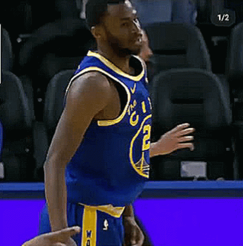 A Basketball Player In A Blue Jersey With The Number 23 On The Front GIF