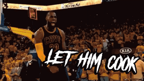 A Basketball Player In A Cavs Jersey Stands In Front Of A Crowd And Says Let Him Cook GIF