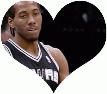 A Basketball Player In A Heart Shaped Frame . GIF